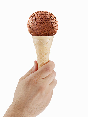 Man holding a cone and Chocolate ice cream