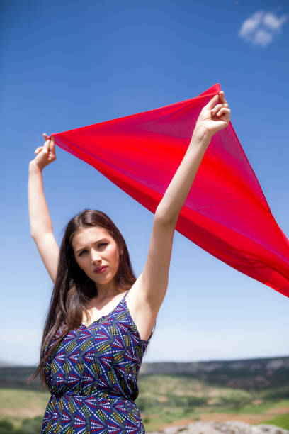 istock a young woman in the spring 1010579764