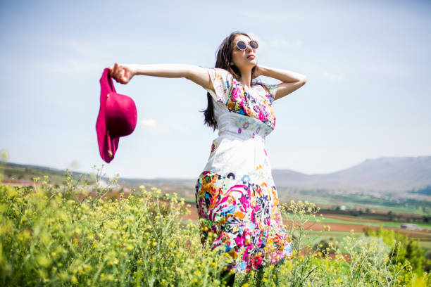 istock a young woman in the spring 1010579792