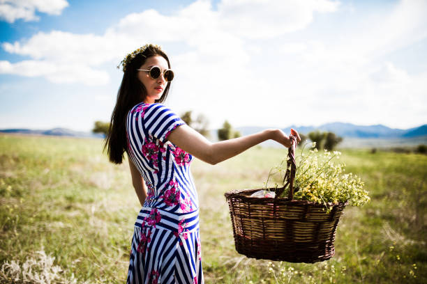 istock a young woman in the spring 1010580106