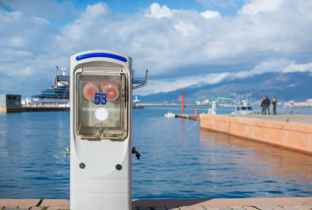 Coastal system for charging boat batteries and filling tanks with water.