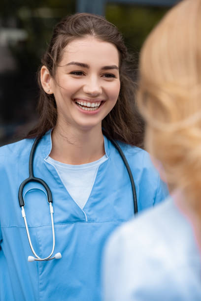 istock smiling medical student talking with lecturer 1010600924
