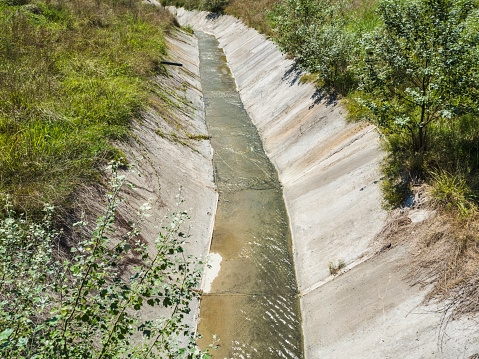 Water runs along the ditch