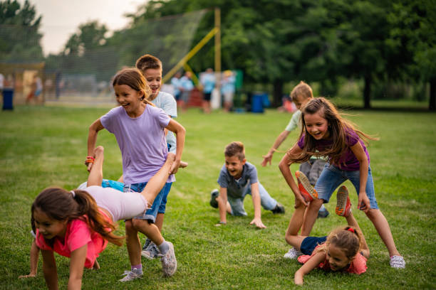 istock Wheelbarrow race in the park 1010610104