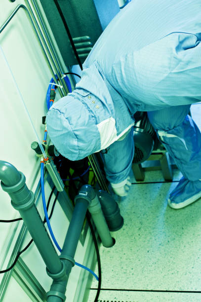 istock Routine Check: Technician Fixing Equipment In The Factory 1010613342