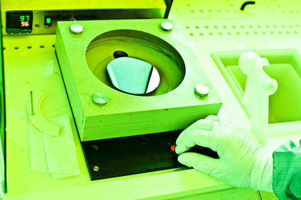 istock Scientist Work Photoresist To Develop Patterns Of Sensors On Semiconductor Wafer In A Photolithography Room 1010614244