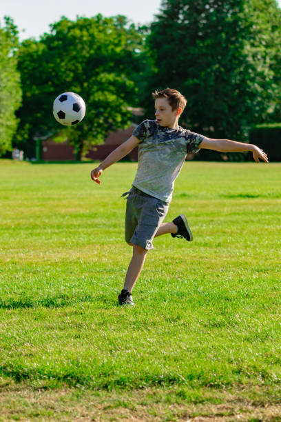 istock Pre-teen caucasian boy playing outside 1010614666