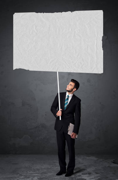 istock Businessman with blank booklet paper 1010614914