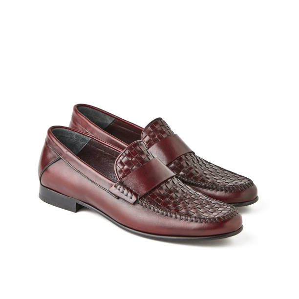 istock Elegant men's brown loafers shoes. Studio, white background 1010617732