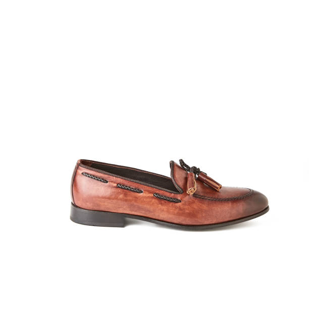 Elegant men's brown loafer shoe. Studio, white background