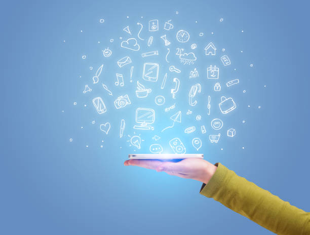 istock Hand with phone and drawn office icons 1010624284