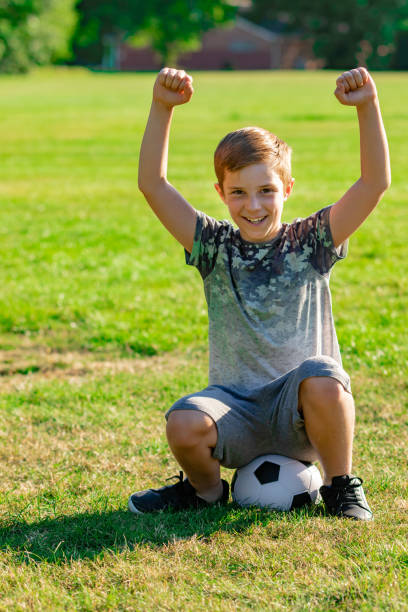 istock Pre-teen caucasian boy playing outside 1010625734