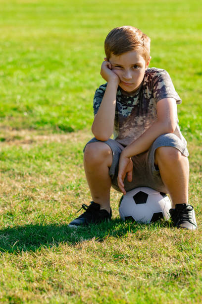 istock Pre-teen caucasian boy playing outside 1010630010