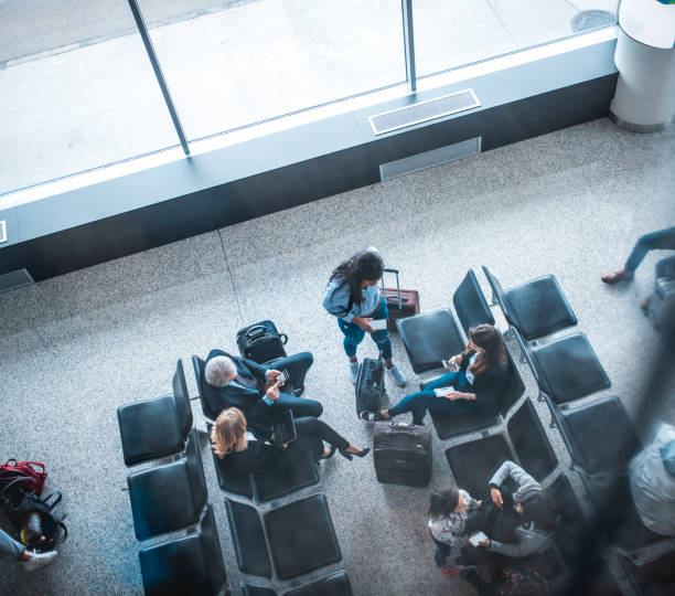 istock Passengers waiting for flights at departure area 1010631800
