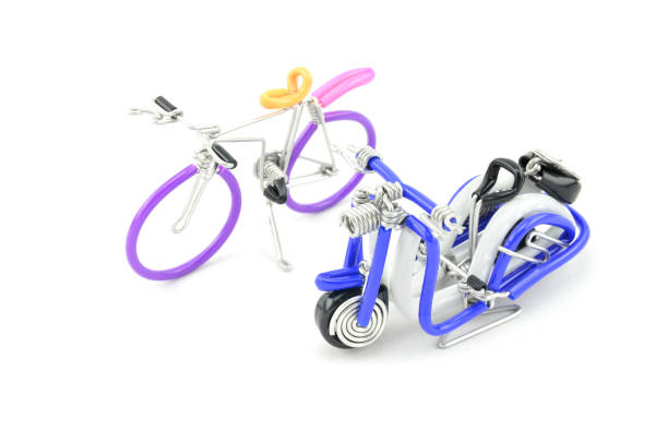 istock miniature bicycle and blue scooter placed side by side 1010638064