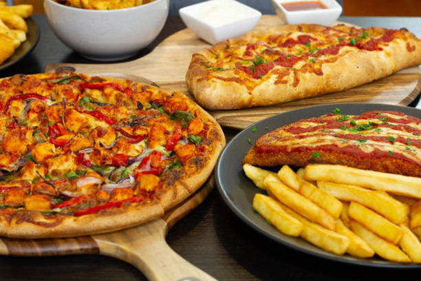 istock Pizza pasta and more dishes on the table 1010651612