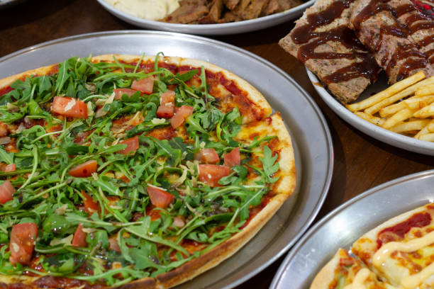 istock Pizza pasta and more dishes on the table 1010651784