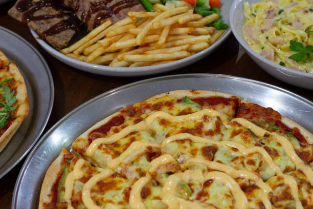 istock Pizza pasta and more dishes on the table 1010651964