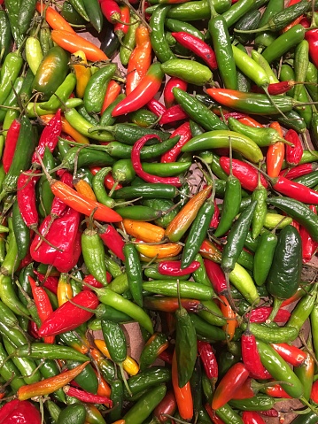 Close up view of red and green  malagueta peppers