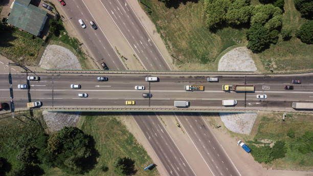 istock Top down aerial view of transportation highway overpass 1010665030