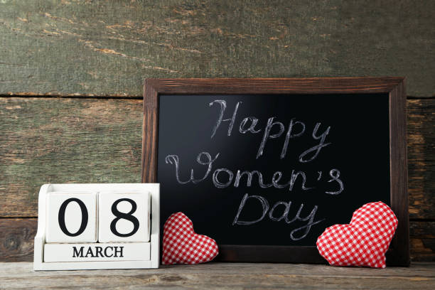 istock Cube calendar with fabric hearts and wooden frame 1010665516