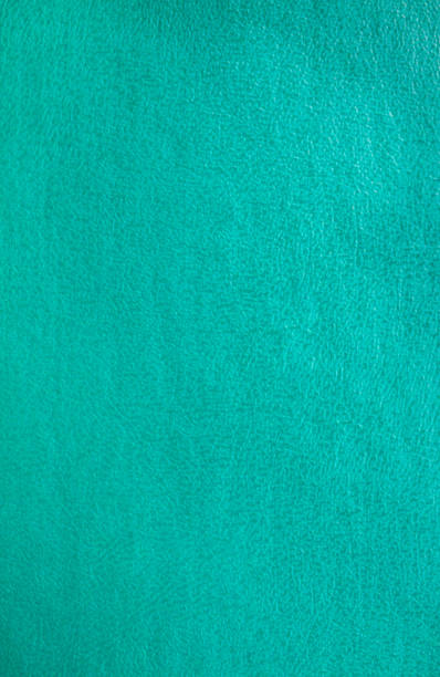 istock Abstract dark emerald green texture. Ribbed fabrics leather background. Old vintage cloth. 1010669156
