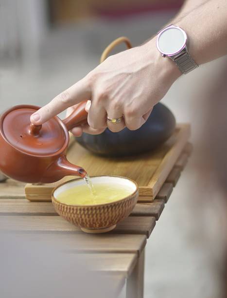 istock drinking tea in a garden tearoom 1010674192
