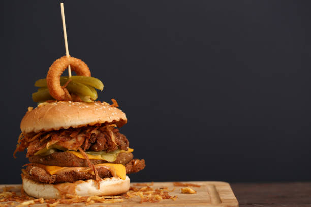 istock Burger with chicken breast and fried onions 1010677778