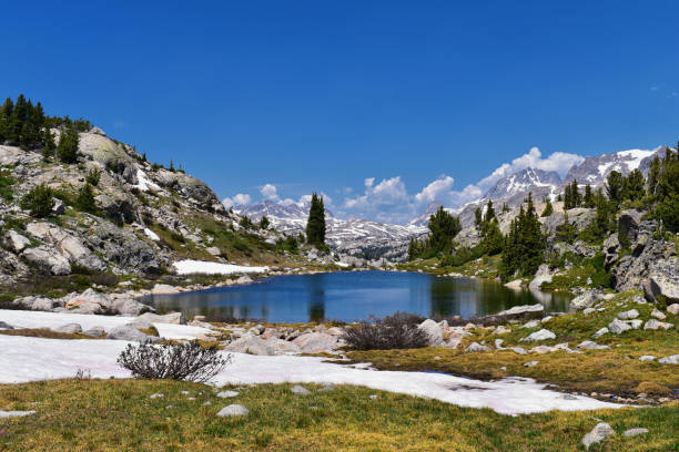 istock Wind River Range, Rocky Mountains, Wyoming, views from backpacking hiking trail to Titcomb Basin from Elkhart Park Trailhead going past Hobbs, Seneca, Island, Upper and Lower Jean Lakes as well as Photographers point. 1010678102