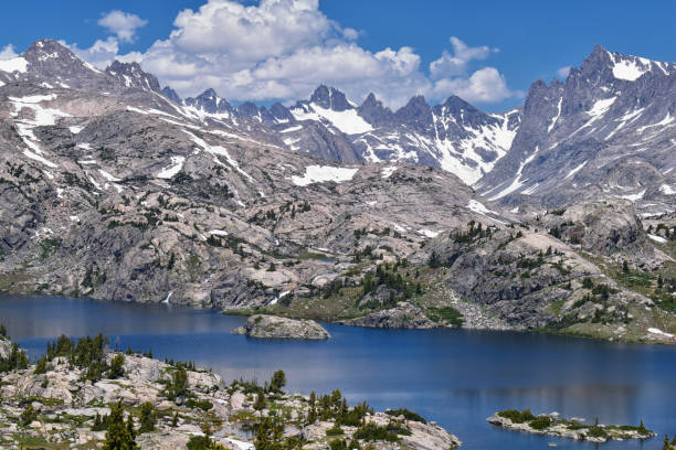 istock Wind River Range, Rocky Mountains, Wyoming, views from backpacking hiking trail to Titcomb Basin from Elkhart Park Trailhead going past Hobbs, Seneca, Island, Upper and Lower Jean Lakes as well as Photographers point. 1010678356