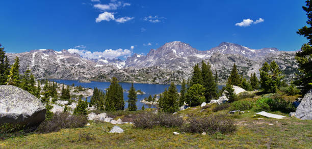 istock Wind River Range, Rocky Mountains, Wyoming, views from backpacking hiking trail to Titcomb Basin from Elkhart Park Trailhead going past Hobbs, Seneca, Island, Upper and Lower Jean Lakes as well as Photographers point. 1010678464