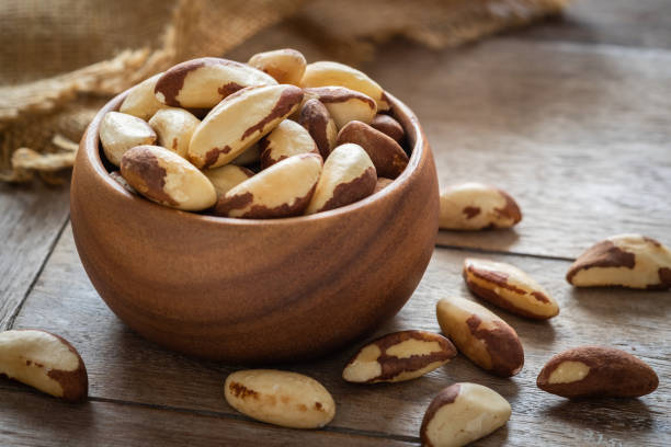 istock Brazil nuts in wooden bowl 1010681400