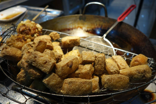 istock Stinky fried tofu at a Shanghai street 1010682424