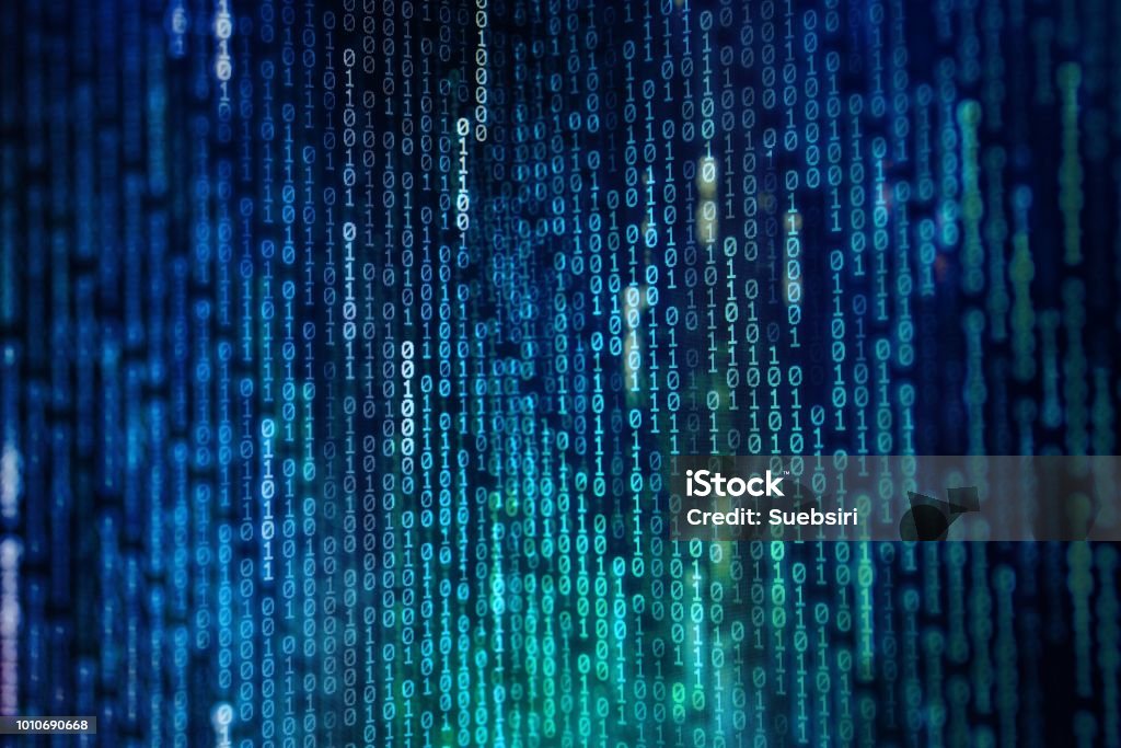 power of big data. binary code information bit on computer monitor screen display. Led light text number one and zero. blur defocus blue bokeh light. technology graphic design background concepts Data Stock Photo
