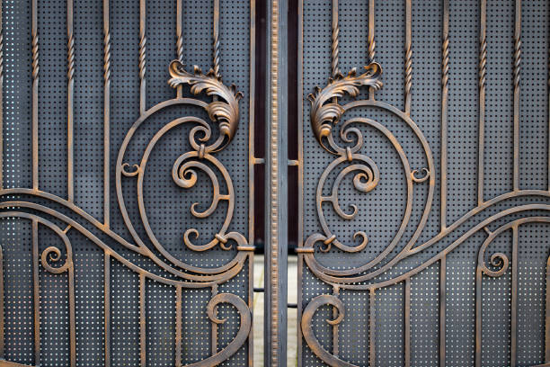 istock wrought-iron gates, ornamental forging, forged elements close-up 1010702224