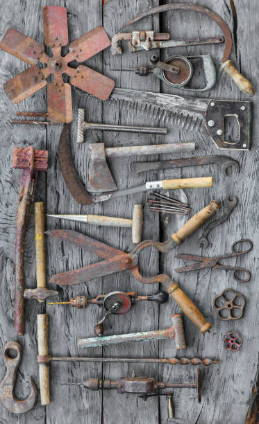 istock old vintage rusty hand tool on a wooden table 1010716880