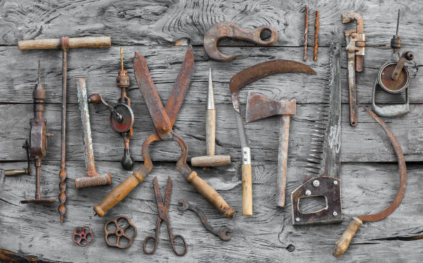istock old vintage rusty hand tool on a wooden table 1010719734