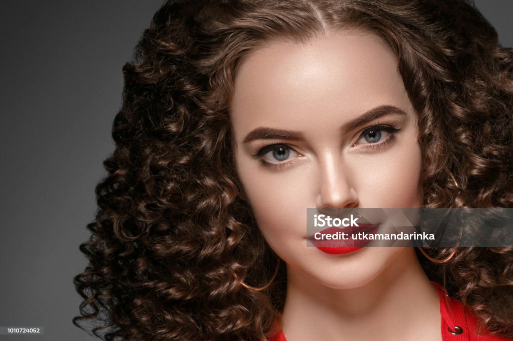 Beautiful Curle Hair Female In Red With Red Lips And Dress Manicure Beauty  Rose Afro Hairstyle Over Red Background Stock Photo - Download Image Now -  iStock