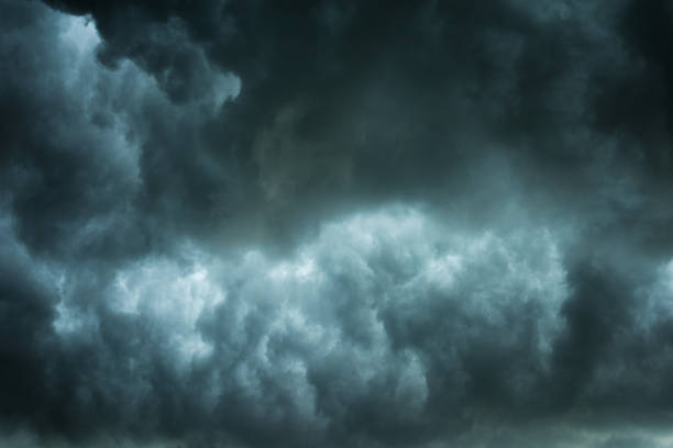 istock Danger storm cloud, Black cloud and thunder storm, Dark sky and motion clouds before rainy 1010728306