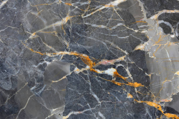 istock Gold, yellow and white patterned of Dark gray marble pattern (Gold Russia), marble texture for design. 1010738594