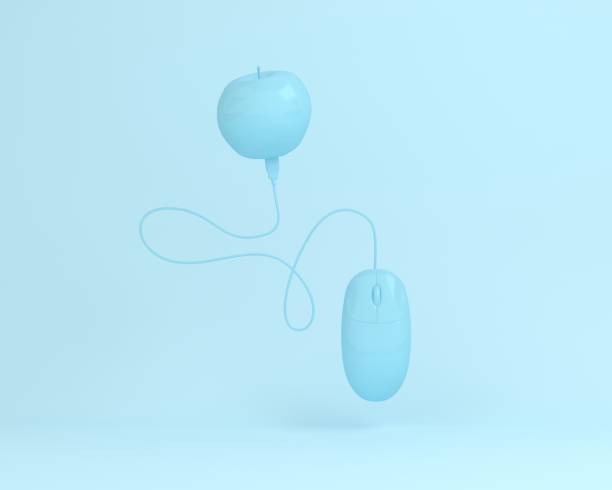 istock Creative layout of apple with computer mouse painted in blue on blue pastel background. minimal office concept. An idea creatively to produce work within an advertising marketing communications. 1010738806