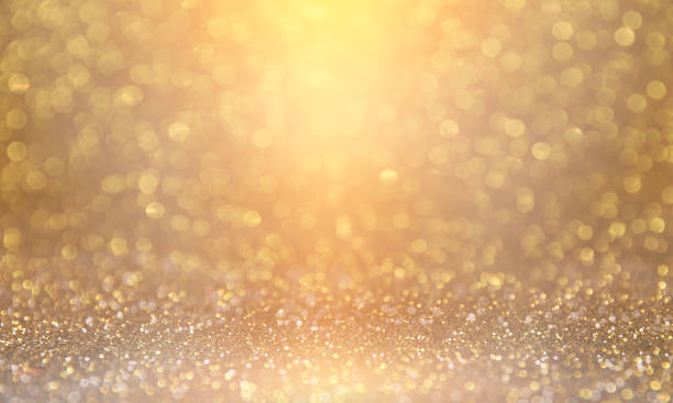 istock Holiday light background.  Christmas and New Year holidays glowing backdrop. Defocused Background With Blinking Stars. Blurred Bokeh. 1010750694