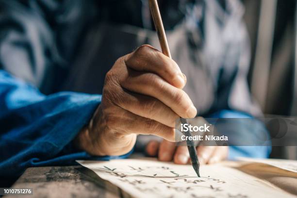 Old Hands Of Man Writing Chinese Script Stock Photo - Download Image Now - Chinese Script, Chinese Language, Chinese Culture