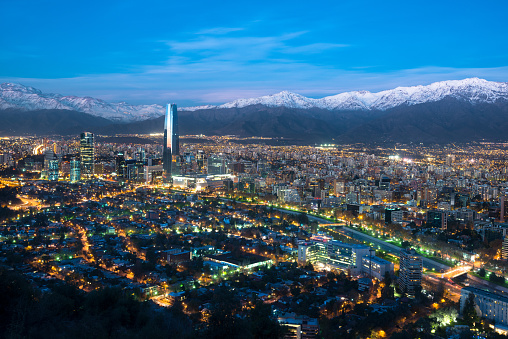 Vista panorámica de los barrios de Providencia y Las Condes con el río Mapocho y la Cordillera de Los Andes en Santiago photo