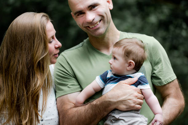 istock Two parents and baby boy 1010754386