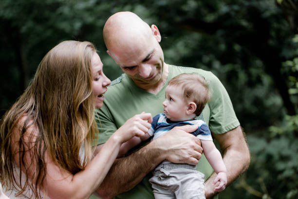 istock Two parents and baby boy 1010754388