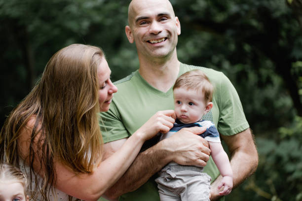 istock Two parents and baby boy 1010754472