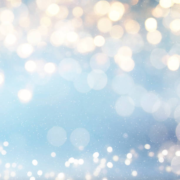 istock Christmas light background.  Holiday glowing backdrop. Defocused Background With Blinking Stars. Blurred Bokeh. 1010754508