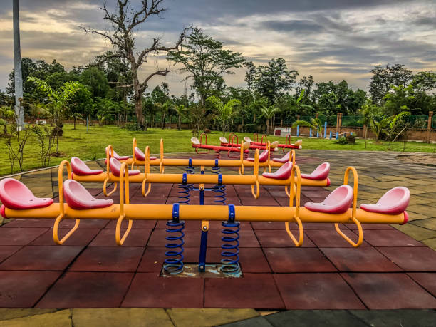 istock beautiful colorful playground in the park 1010758352