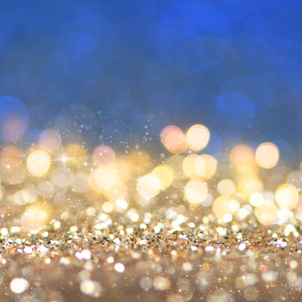 istock Christmas light background.  Holiday glowing backdrop. Defocused Background With Blinking Stars. Blurred Bokeh. 1010758720